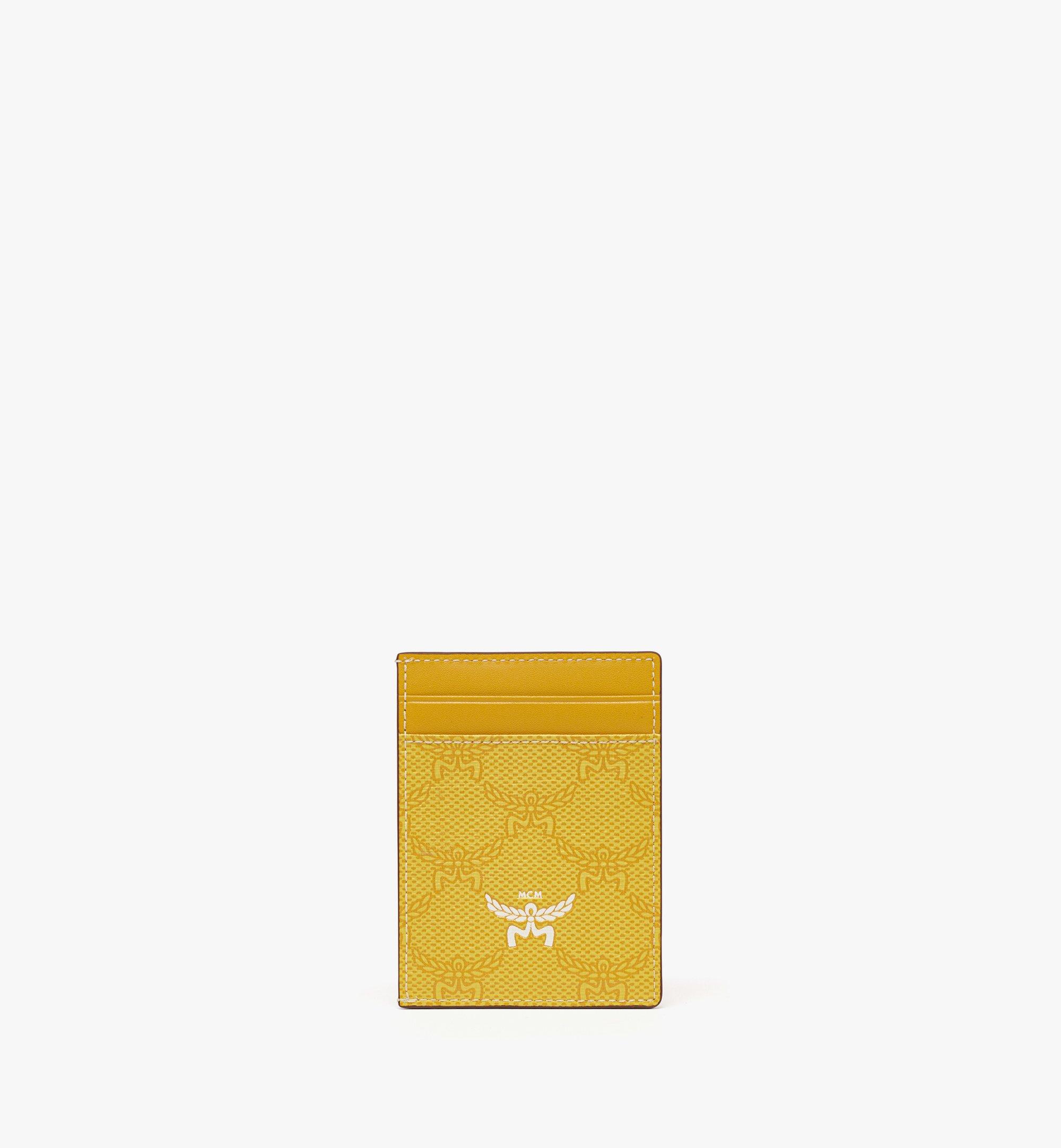 Mcm gold wallet best sale